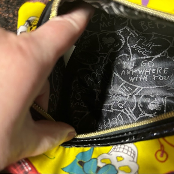 NWOT Betsey Johnson makeup travel bag in vibrant yellow with skull design. - Picture 9 of 10